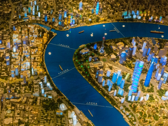 Looking north in this view of the scale model of the city, the Bund is on the bank of the Huangpu River on the left (west) and the new Pudong skyscrapers are on the east bank, Shanghai U