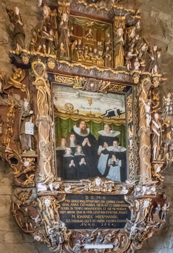 The Hiermann epitaph was carved and painted by Andrew Smith in 1664; it was made in memory of Jens Pedersøn Hiermann. The epitaph is very rich in imagery and perhaps the finest example